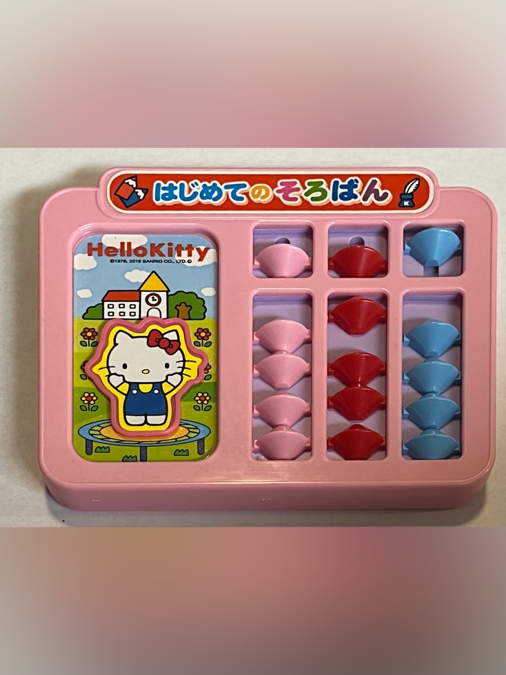 Jumping Hello Kitty Pink Counting Toy with Pink, Red & Blue Beads
